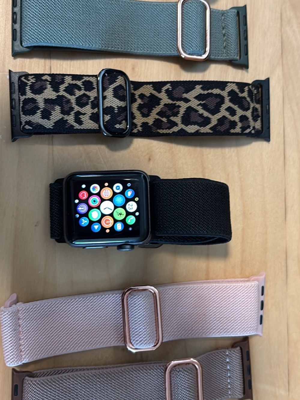Apple Watch with Black Sport Loop and Mixed Interchangeable Bands
